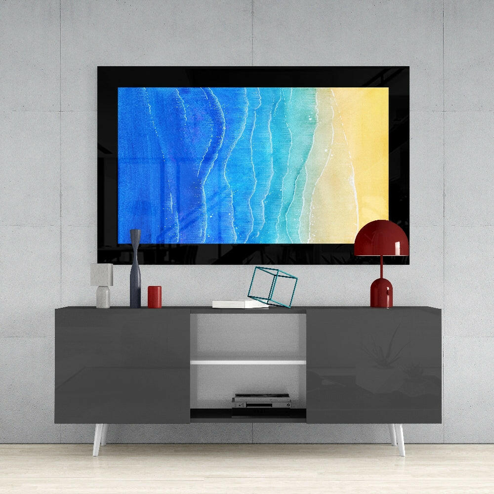 Sun Sea Beach glass wall art styled above a console in a reading nook