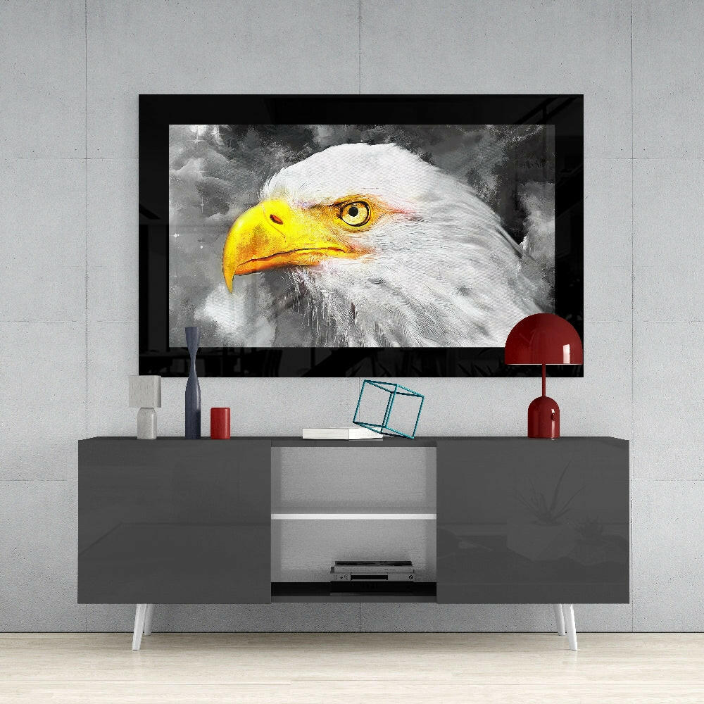 Eagle glass wall art styled above a console in a library