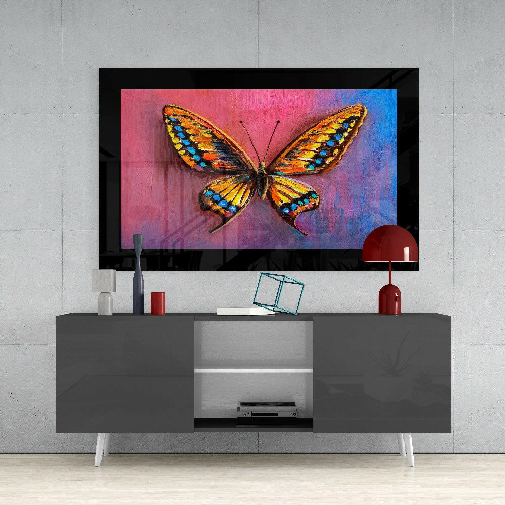 Purple Blue Butterfly glass wall art styled above a console in a reading nook