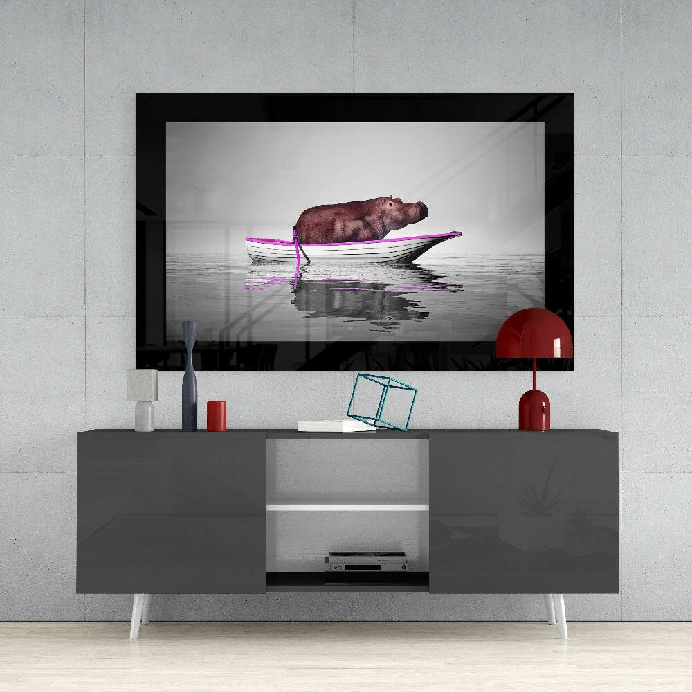 Hippo glass wall art styled above a sideboard in a reading nook