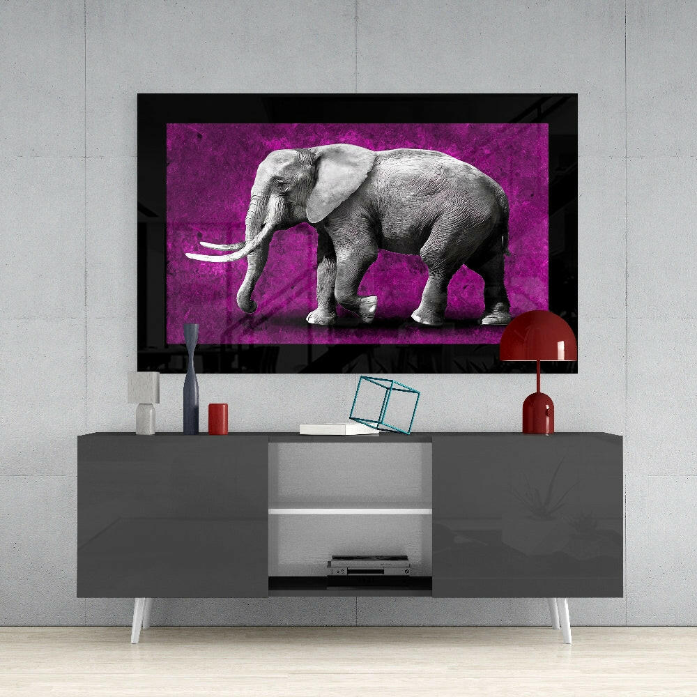 Elephant glass wall art styled above a console in a foyer