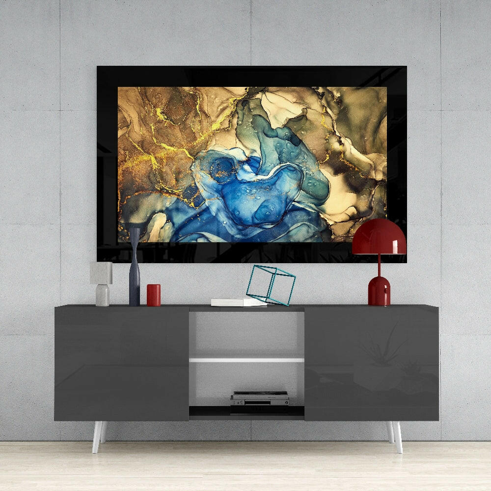 Gold Blue glass wall art styled above a console in a bedroom