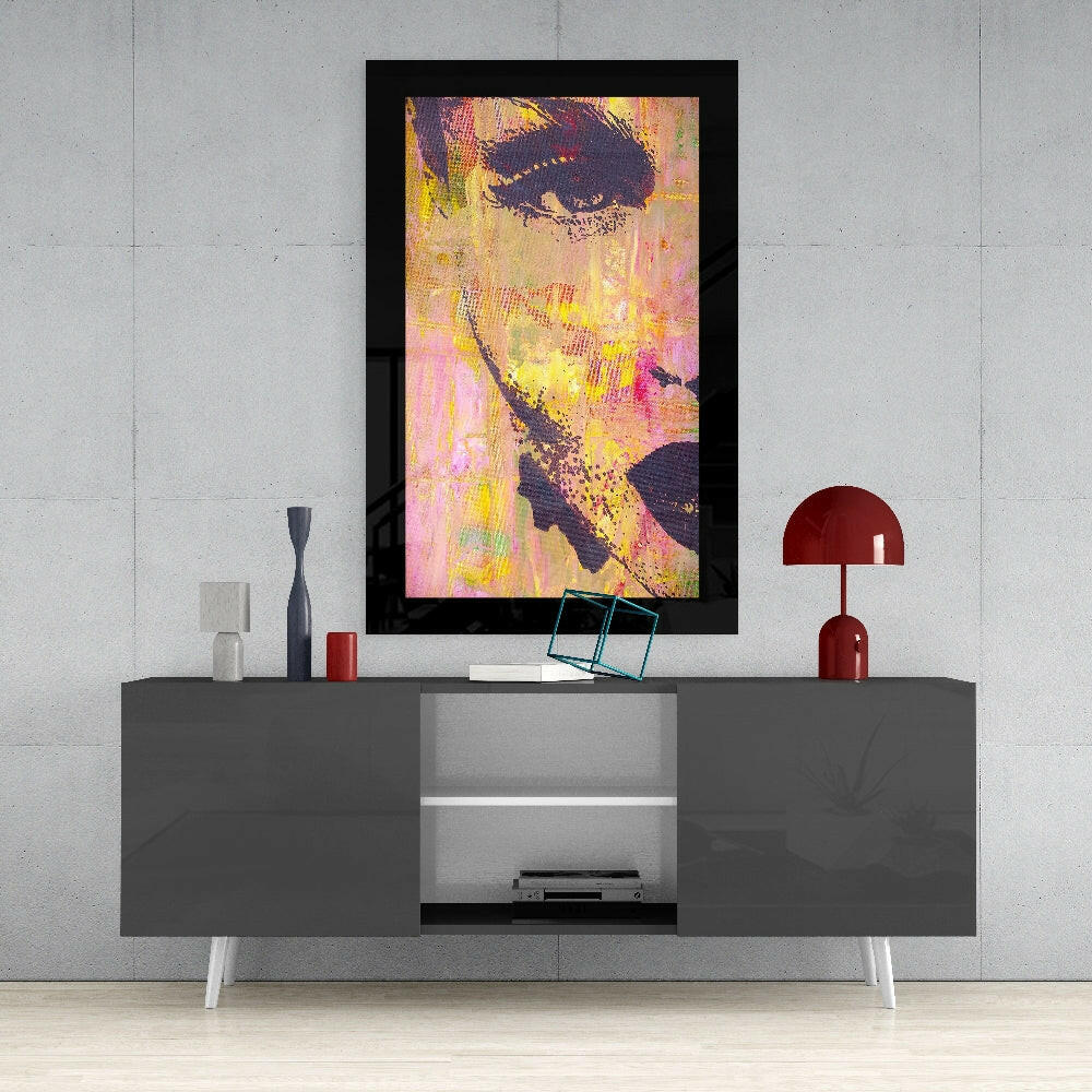 Woman Portrait glass wall art styled above a console in a creative studio
