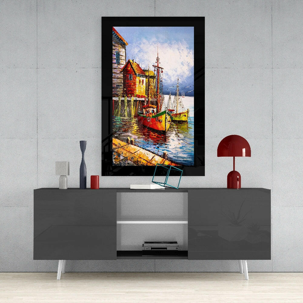 Fishing Town glass wall art styled above a console in a reading nook