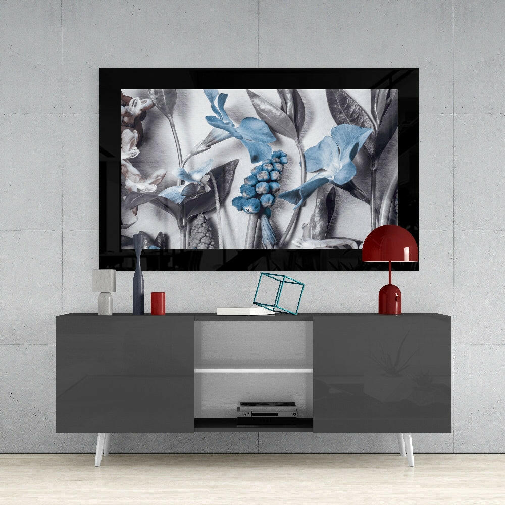 Flower Arrangement glass wall art styled above a console in a reading nook
