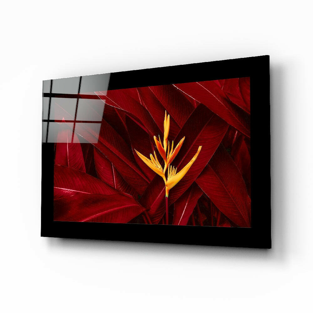 Red Leaves glass wall art displayed above a sideboard in a study