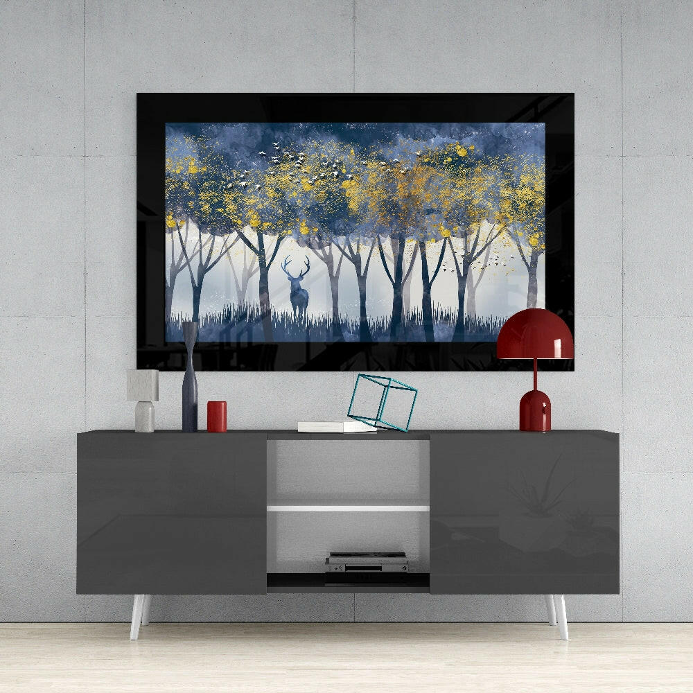 Silent Forest glass wall art styled above a console in a reading nook