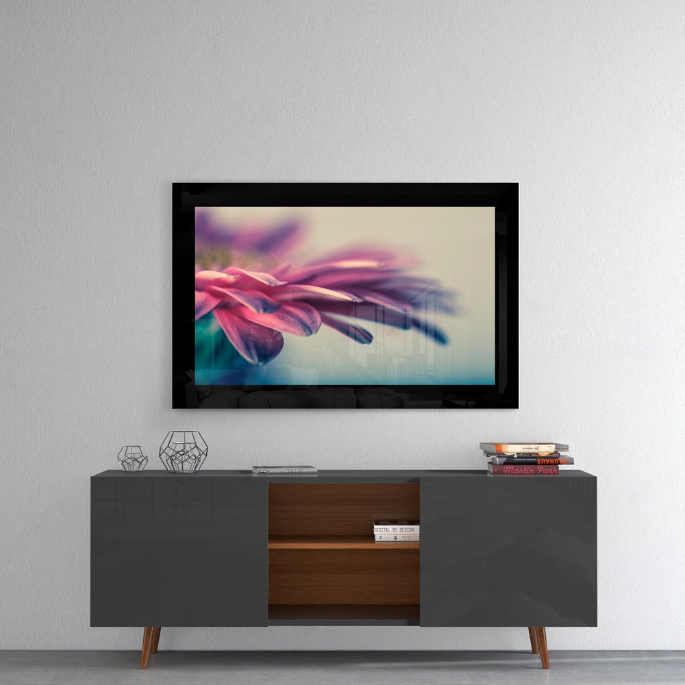 Flower glass wall art styled above a console in a reading nook