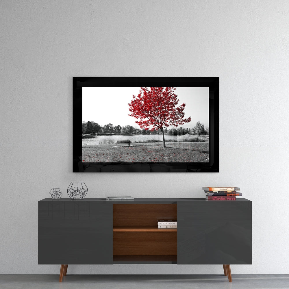 Red Tree glass wall art styled above a console in a meditation room
