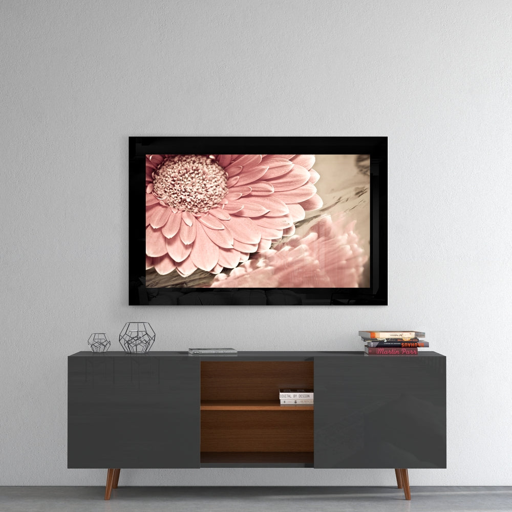 Pink Flower glass wall art styled above a console in a reading nook