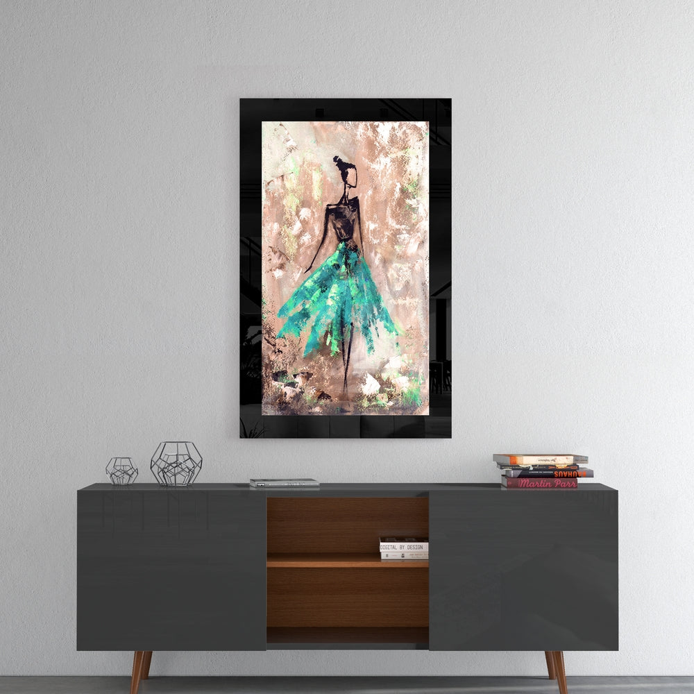 Ballerina glass wall art styled above a console in a reading nook