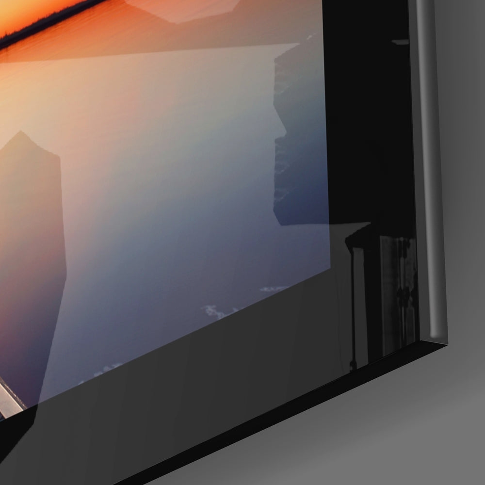 Sunset close-up showing pier and scarlet horizon