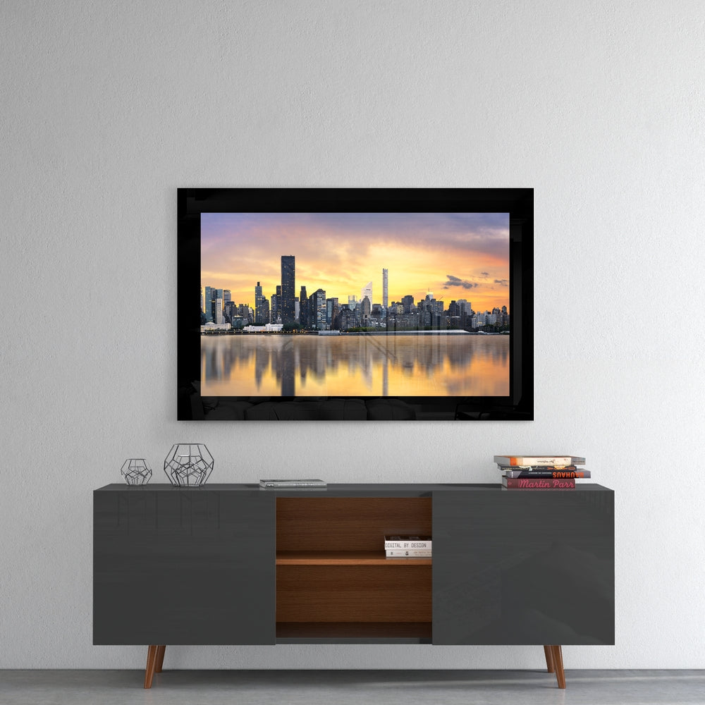 The City glass wall art styled above a console in a reading nook