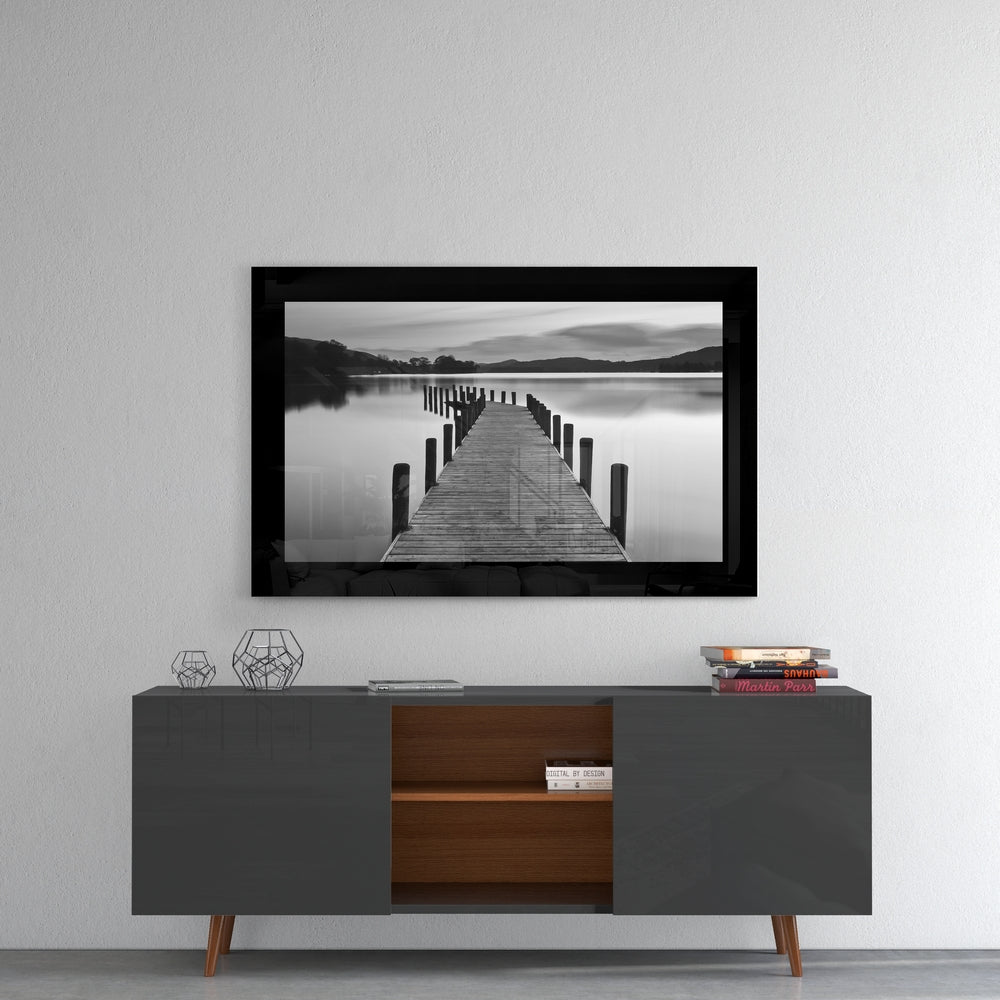 Pier glass wall art styled above a console in a meditation room