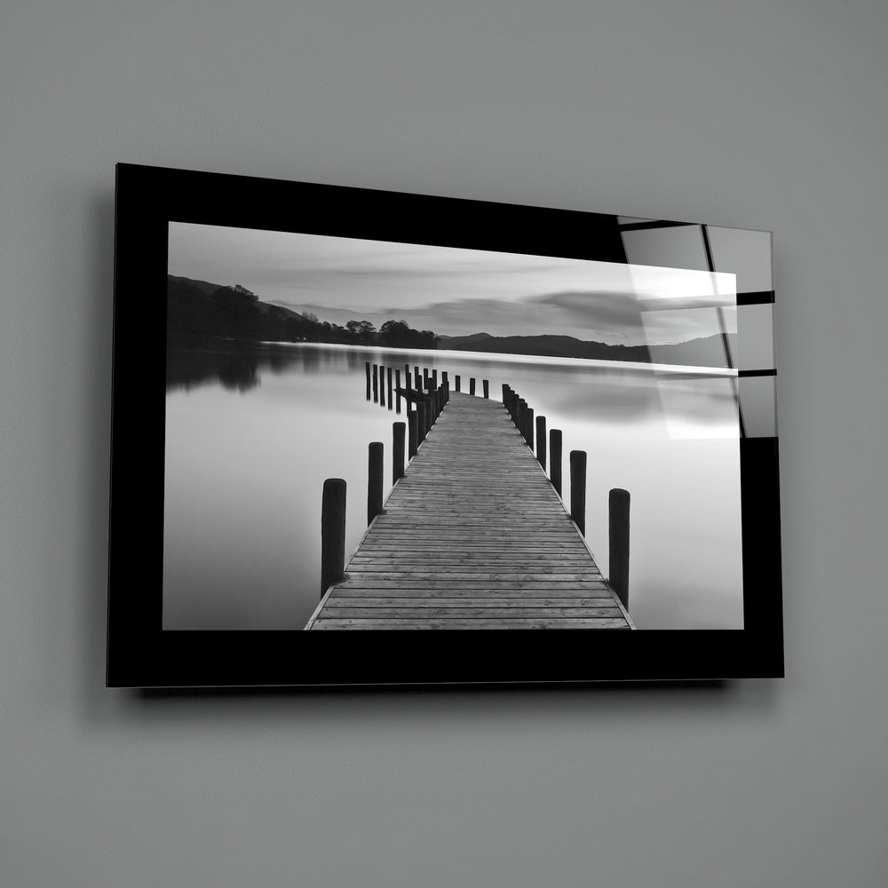 Editorial-photo panel bringing monochrome calm to a coastal cottage