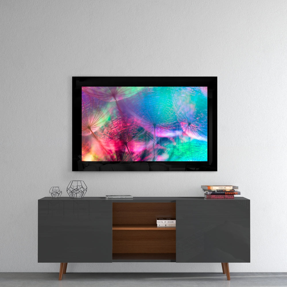 Colorful Dandelions glass wall art styled above a console in a reading nook