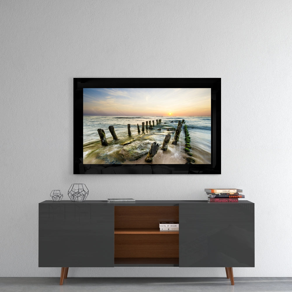 Sunset glass wall art styled above a console in a meditation room