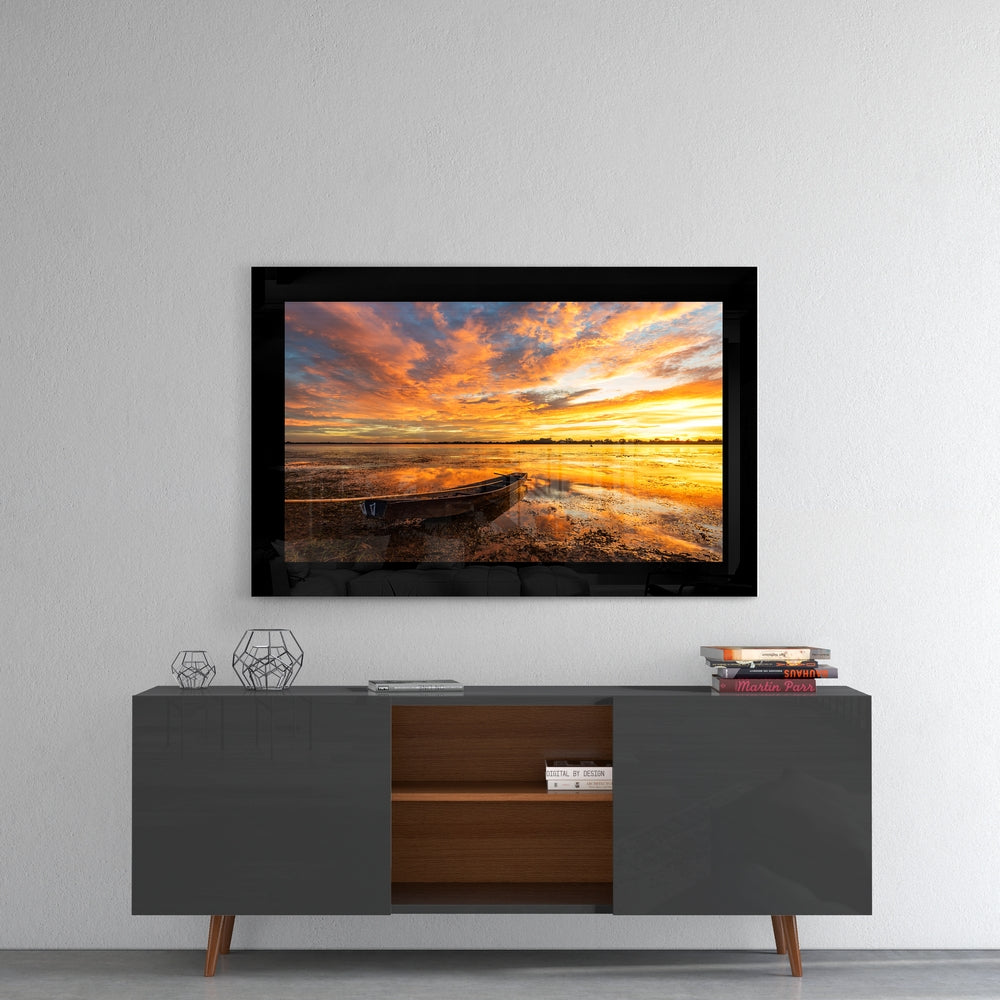 Clouds and Sunset glass wall art styled above a console in a man cave