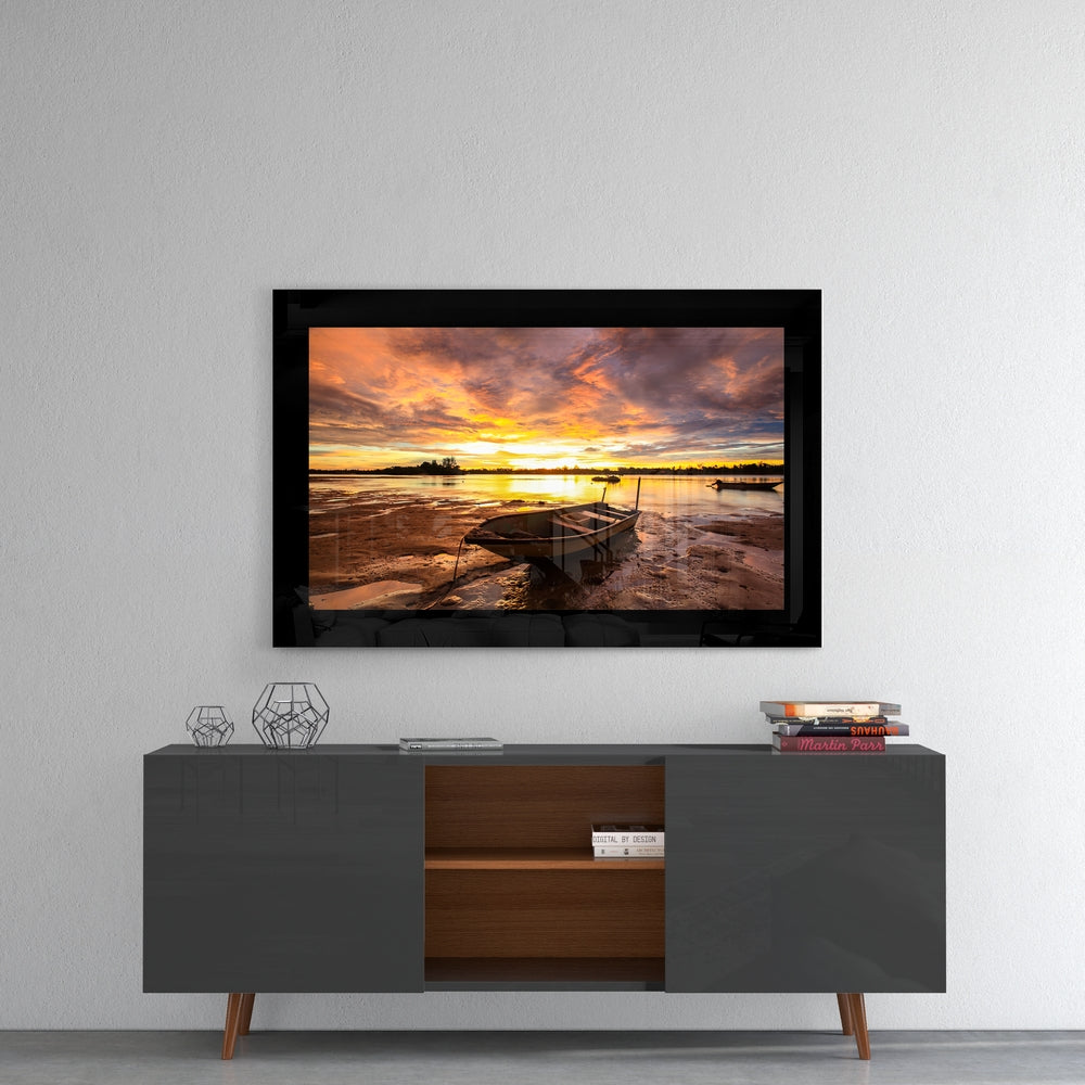 Sunset glass wall art styled above a console in a man cave