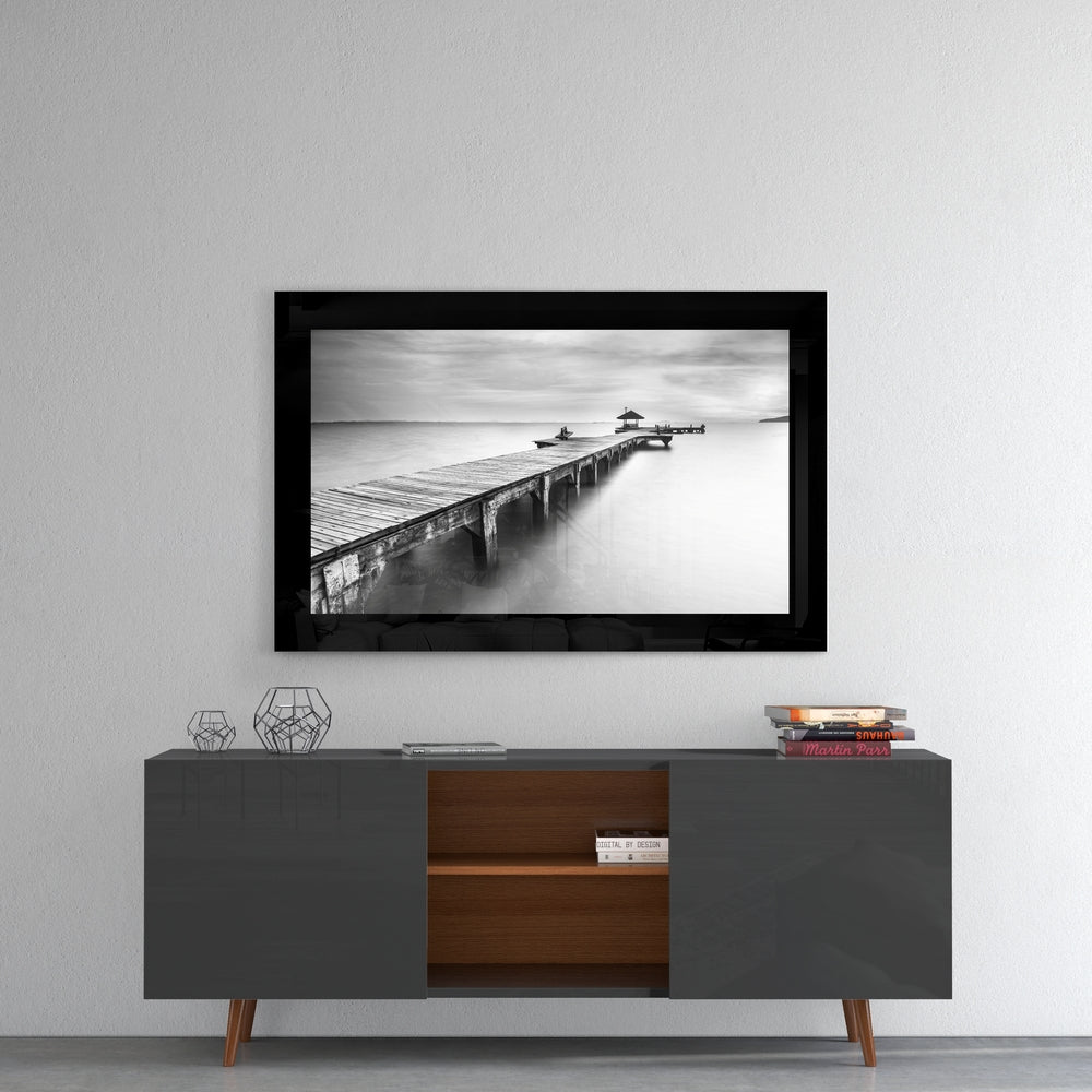 Pier glass wall art styled above a console in a meditation room