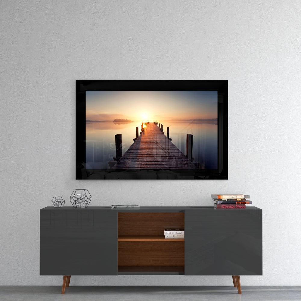 Sunset glass wall art styled above a console in a meditation room