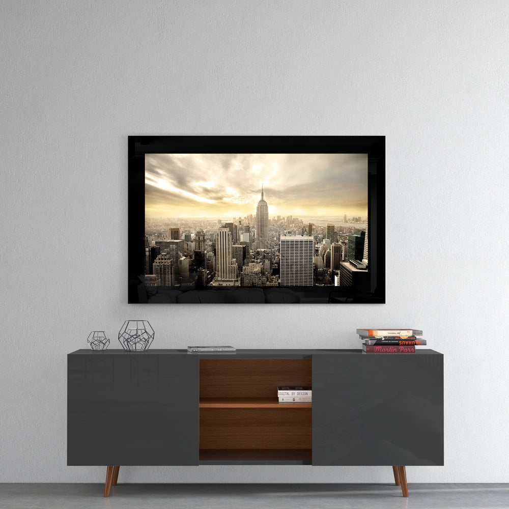 New York glass wall art styled above a console in a foyer