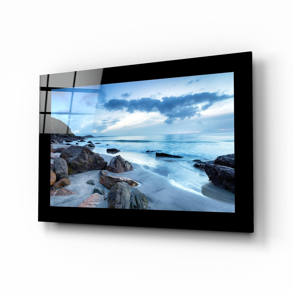 Coast glass wall art displayed above a bed in a bedroom