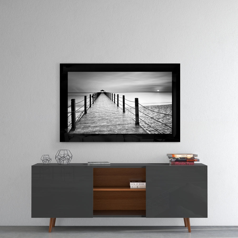 Pier glass wall art styled above a console in a meditation room