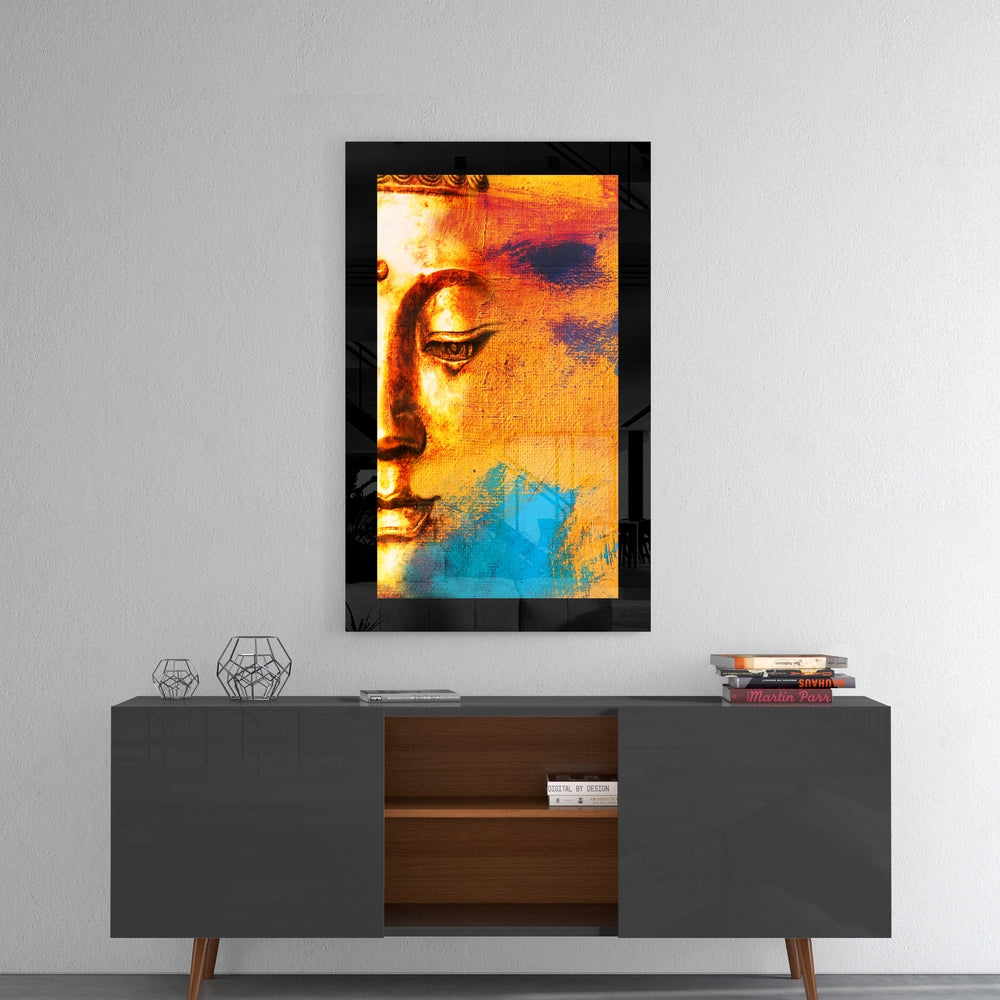 Buddha glass wall art styled above a sideboard in a bedroom