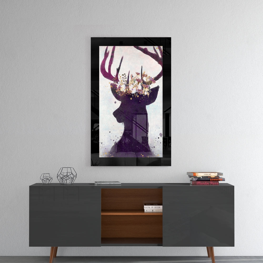 Deer glass wall art styled above a console in a reading nook