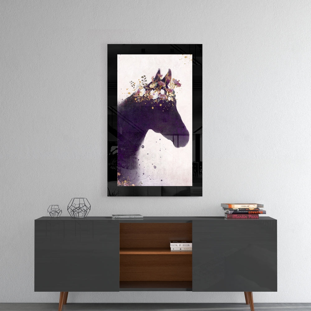 Horse glass wall art styled above a console in a reading nook