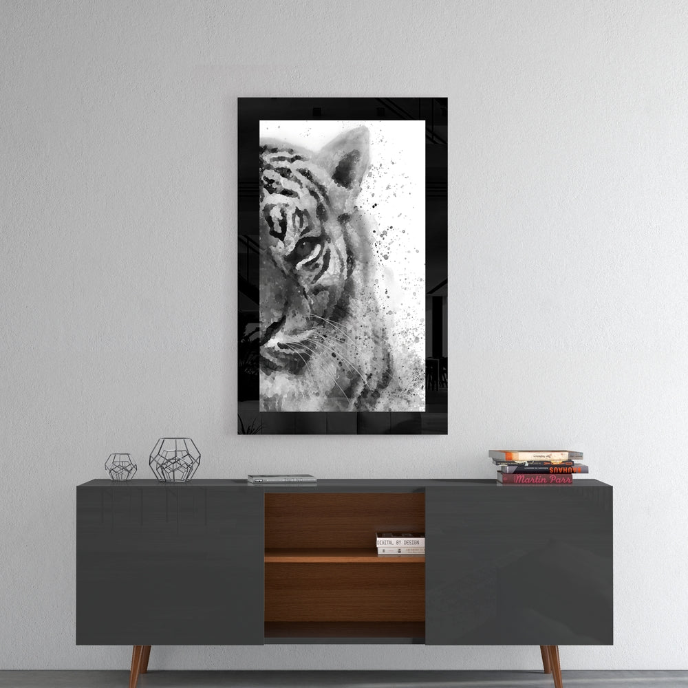 Tiger glass wall art styled above a console in a reading nook