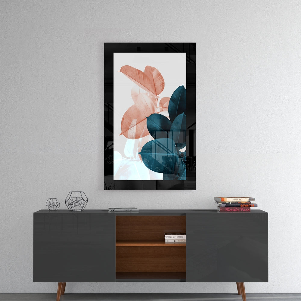 Leaves glass wall art styled above a console in a reading nook