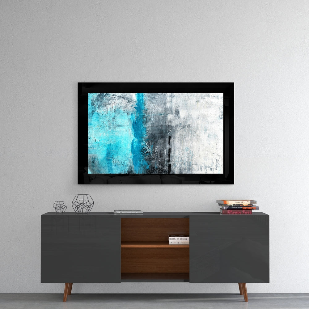 Blue and Blue glass wall art styled above a console in a foyer