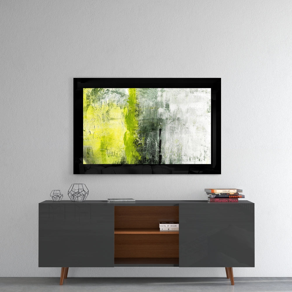 Green and Green glass wall art styled above a console in a foyer