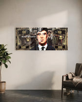 A gold-toned hundred-dollar note styled as a cinematic collage, with a front-facing portrait of a blue-eyed 1920s gangster in a pinstripe suit smoking a cigarette amid drifting smoke. panoramic glass wall art C