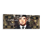 A gold-toned hundred-dollar note styled as a cinematic collage, with a front-facing portrait of a blue-eyed 1920s gangster in a pinstripe suit smoking a cigarette amid drifting smoke. panoramic glass wall art F