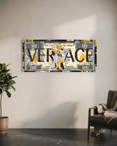 A hundred-dollar note reworked with bold black display lettering over a gold baroque pattern, with two flirtatious cartoon rabbits posed at the center amid yellow paint splashes. panoramic glass wall art C