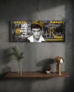 A stern crowned man in a grayscale portrait set over a black-and-gold one-hundred-dollar bill. panoramic glass wall art D