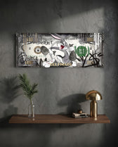 A grinning cartoon rabbit dashing with dollar-sign money bags across a silver-toned hundred-dollar bill. panoramic glass wall art D