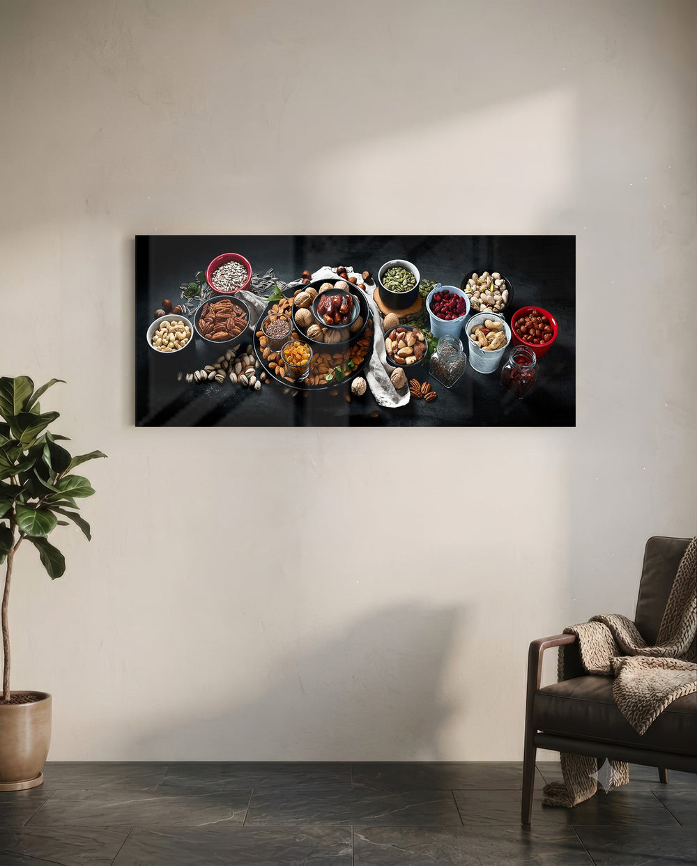 An overhead spread of mixed nuts, seeds, and dried fruit in bowls on a dark surface. panoramic glass wall art C