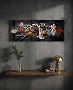 An overhead spread of mixed nuts, seeds, and dried fruit in bowls on a dark surface. panoramic glass wall art D