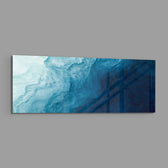 A flowing abstract that drifts from pale misty blue into deep navy like moving water. panoramic glass wall art E