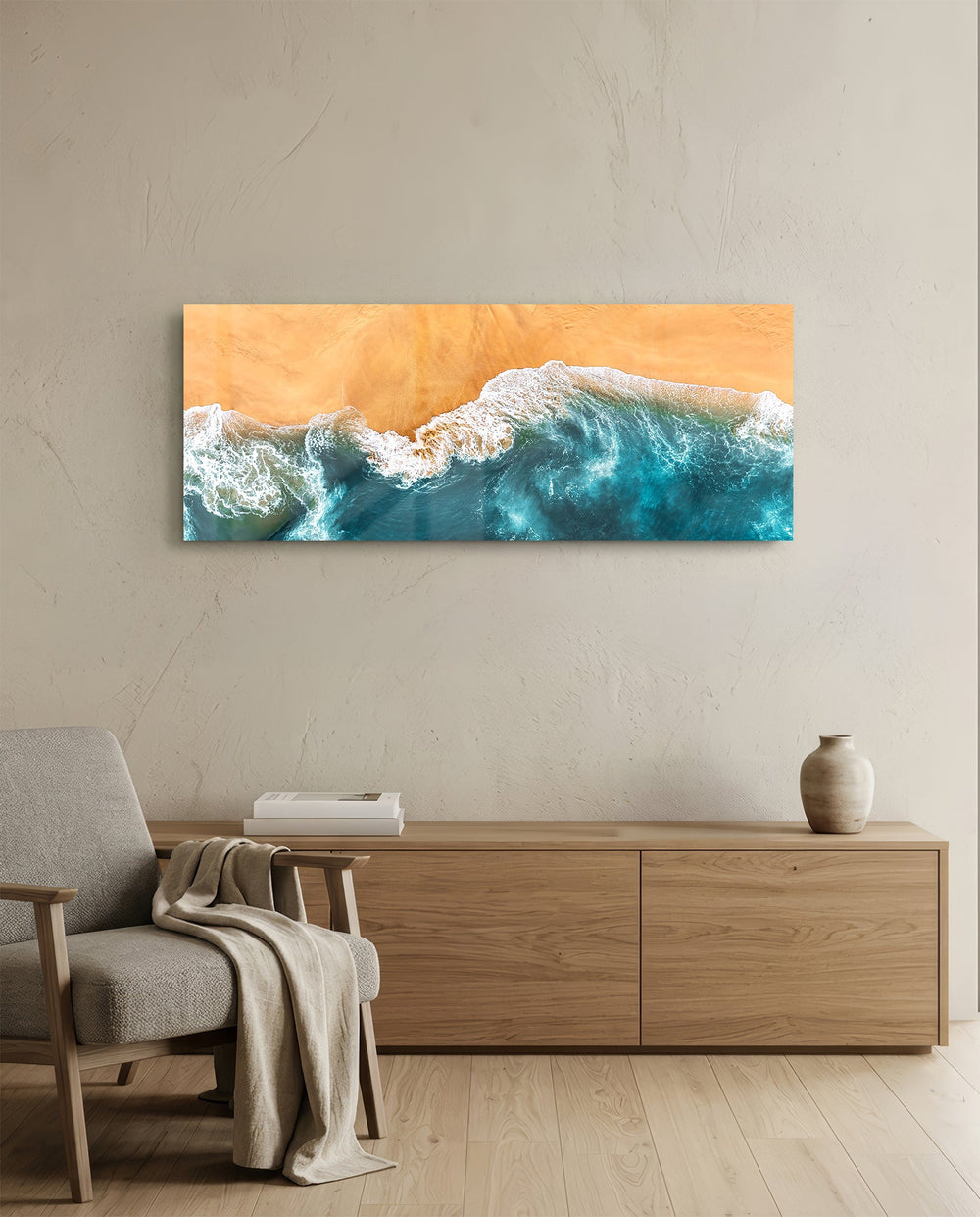 A top-down aerial view of turquoise waves rolling in white foam onto golden sand. panoramic glass wall art A