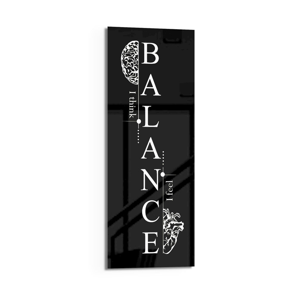 Monochrome motivational typography panel spelling the word balance vertically, flanked by a line-drawn brain and an anatomical heart. panoramic glass wall art D