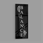 Monochrome motivational typography panel spelling the word balance vertically, flanked by a line-drawn brain and an anatomical heart. panoramic glass wall art E
