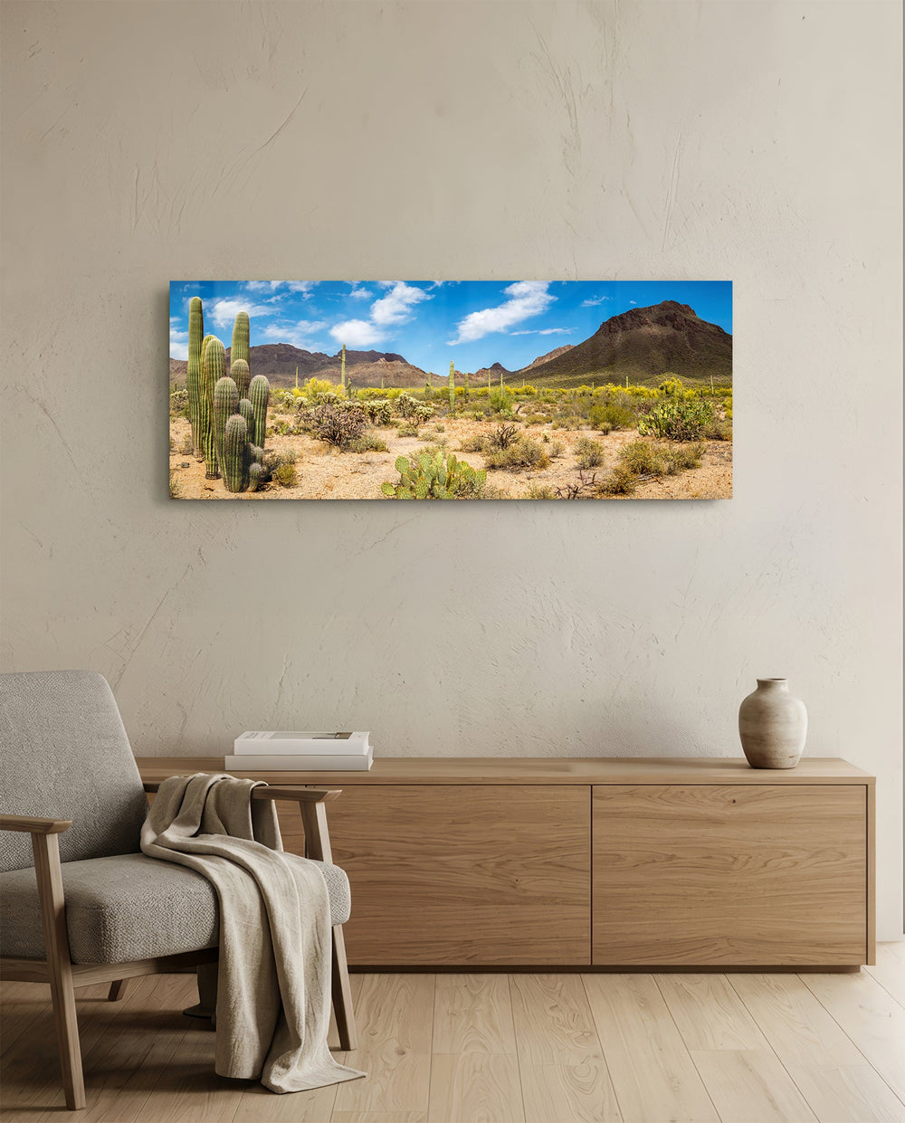 Sun-drenched Sonoran desert panorama with towering saguaro cacti, scrub and rugged mountains under a bright blue sky dotted with puffy clouds. panoramic glass wall art A