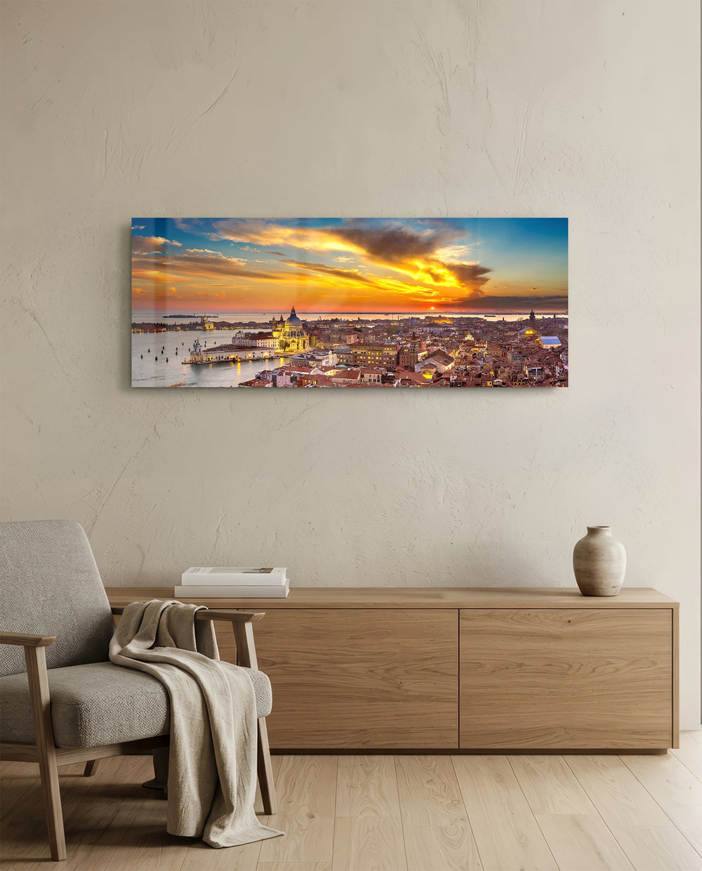 Aerial panoramic view of Venice at sunset, a great domed basilica and terracotta rooftops glowing beneath a fiery orange and blue sky over the lagoon. panoramic glass wall art A