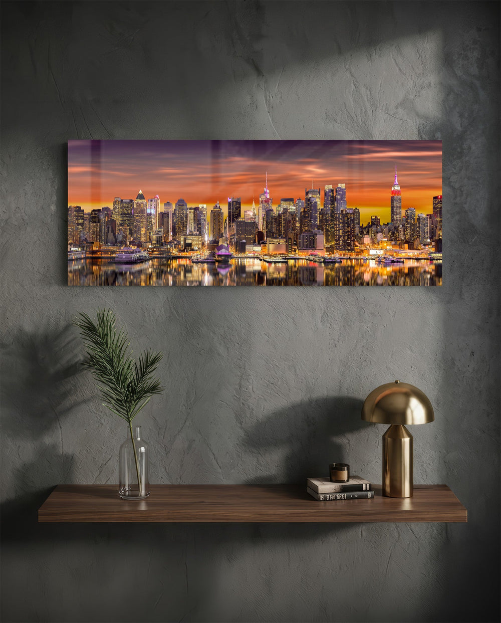 Panoramic metropolitan skyline at sunset, dense illuminated skyscrapers glowing beneath a fiery orange and violet sky, mirrored in the river below. panoramic glass wall art D