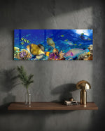 Vivid underwater panorama of a tropical coral reef alive with colorful fish, sunlight rippling through deep blue water. panoramic glass wall art D